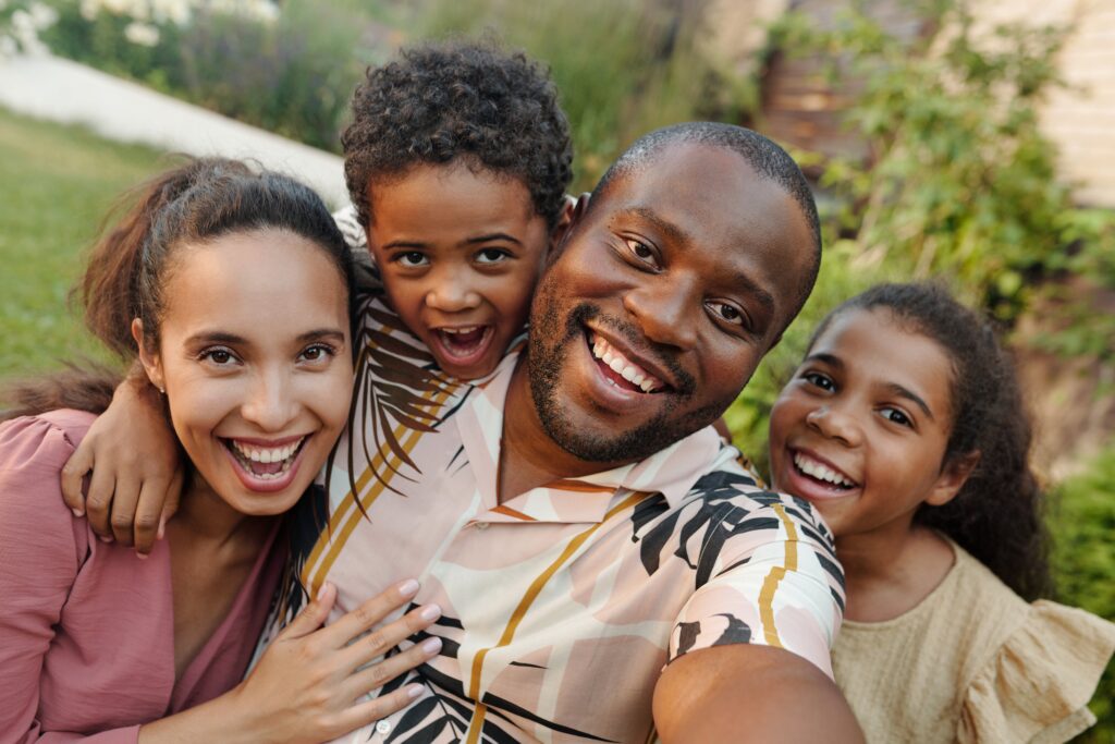 Smiling family of four